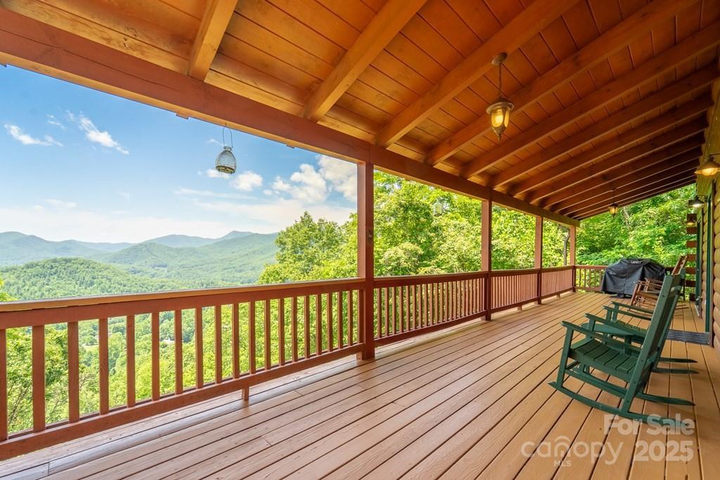561 Signal Ridge Sylva, NC 28779 - Photo 8 of 48 a view of a balcony with wooden floor