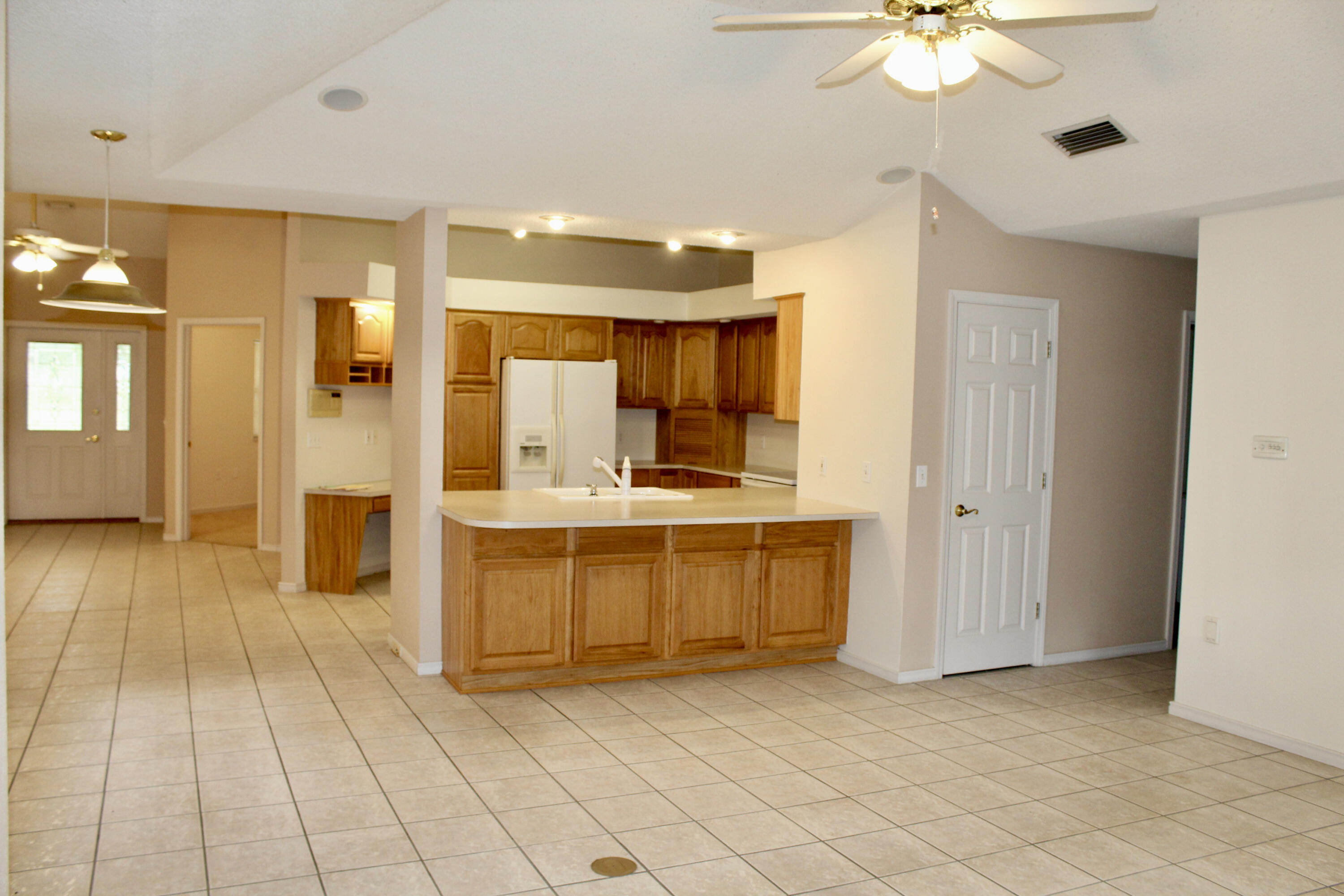 249 Country Manor Road DeFuniak Springs, FL 32435 - Photo 15 of 35 from living room into kitchen