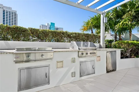 a view of kitchen with outdoor kitchen