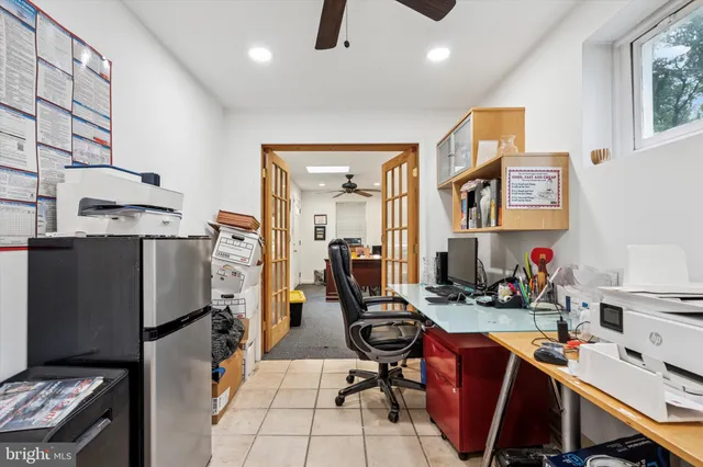 a room with furniture a washer and dryer