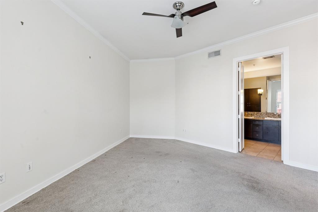 2950 McKinney Avenue, Unit 424 Dallas, TX 75204 - Photo 11 of 25 a view of a room with a hallway
