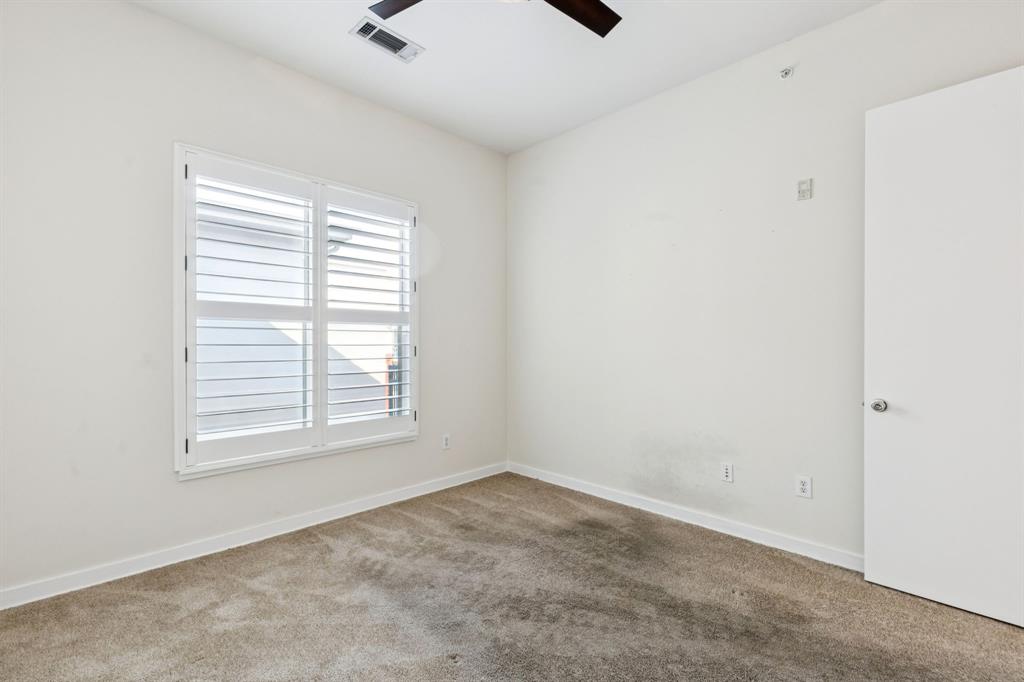 2950 McKinney Avenue, Unit 424 Dallas, TX 75204 - Photo 18 of 25 an empty room with windows