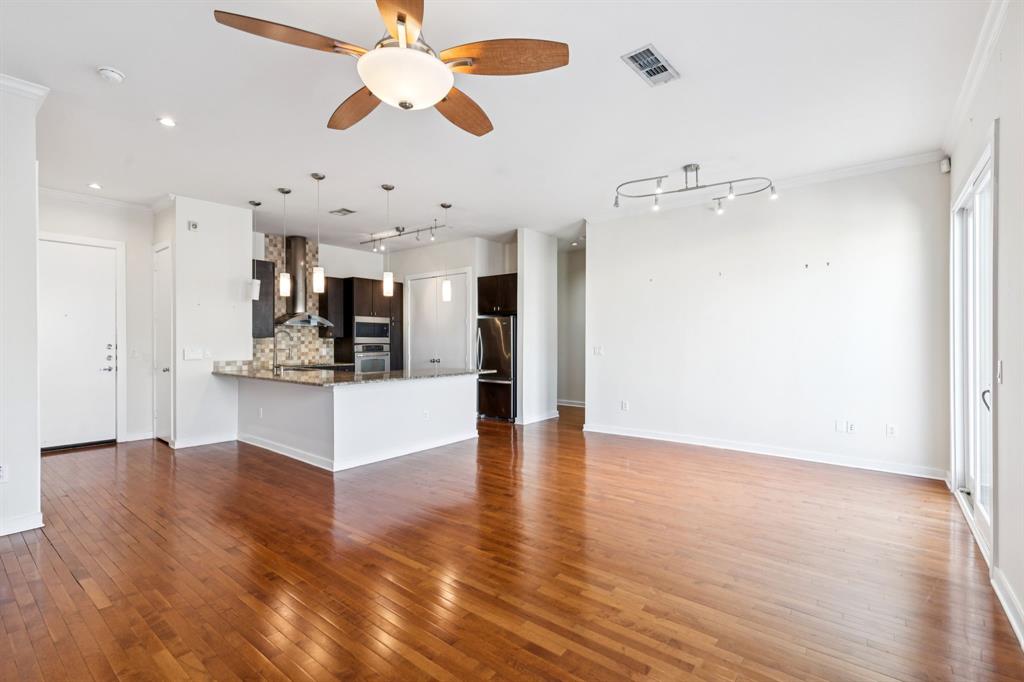 2950 McKinney Avenue, Unit 424 Dallas, TX 75204 - Photo 7 of 25 a view of an empty room and kitchen view