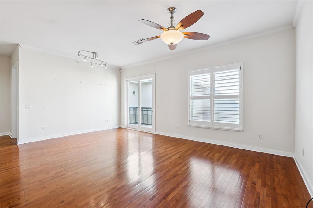 2950 McKinney Avenue, Unit 424 Dallas, TX 75204 - Photo 8 of 25 wooden floor in an empty room with a window