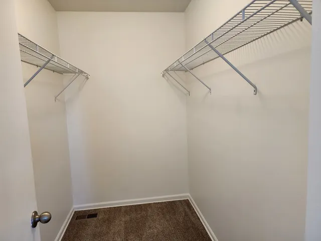 a view of a room with racks on the wall