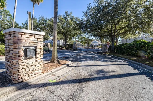 an aerial view of multiple houses with yard