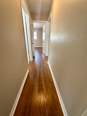 a bathroom with a sink and a window