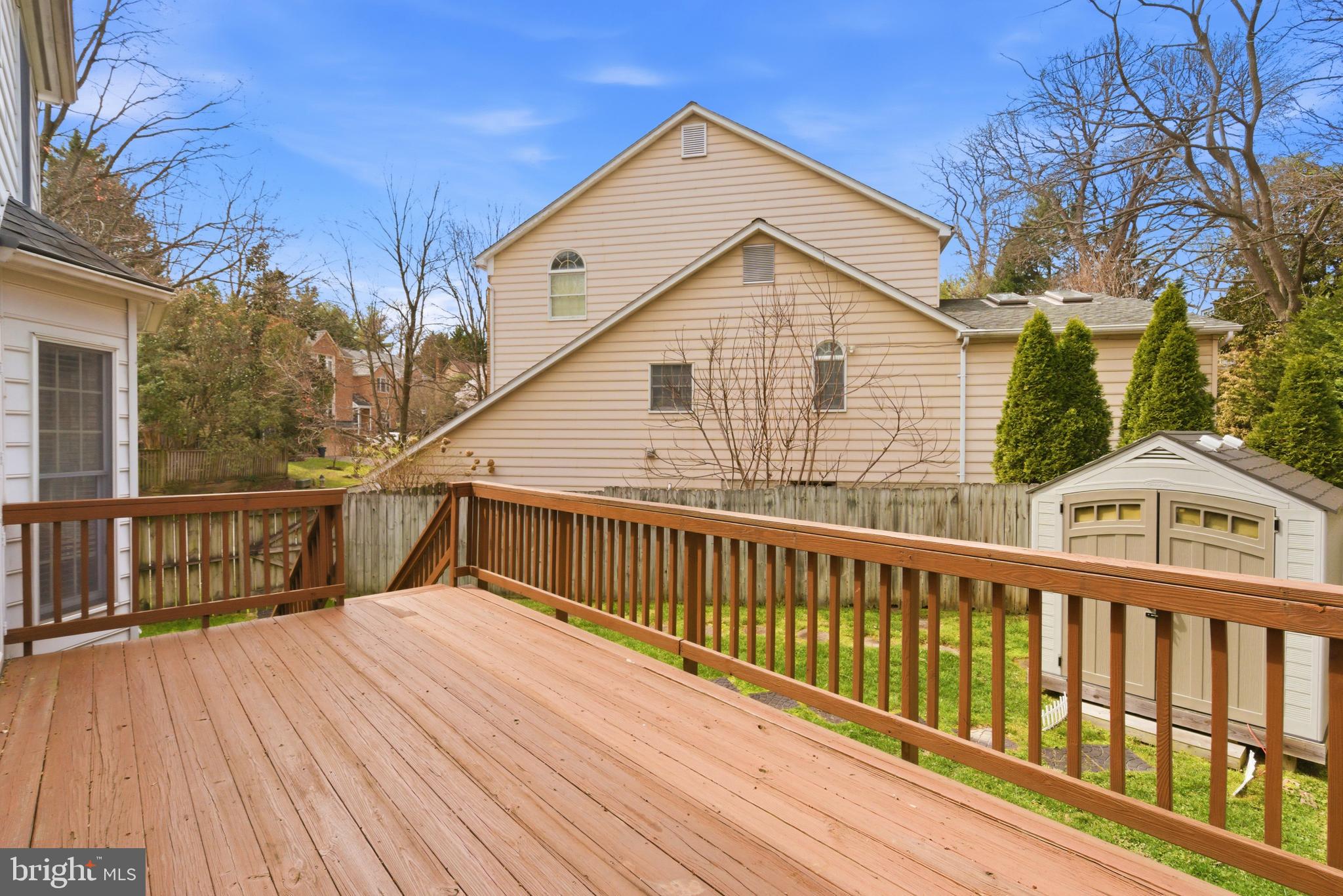 8901 Ellsworth Court Silver Spring, MD 20910 - Photo 24 of 43 a view of a wooden deck and a yard