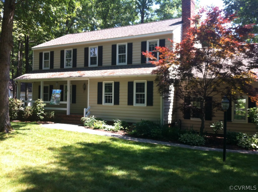 1231 Coalfield Road Midlothian, VA 23114 - Photo 1 of 12 a front view of a house with a yard
