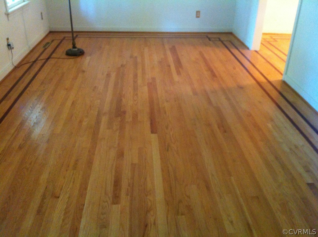 1231 Coalfield Road Midlothian, VA 23114 - Photo 5 of 12 a view of a room with wooden floor and curtain