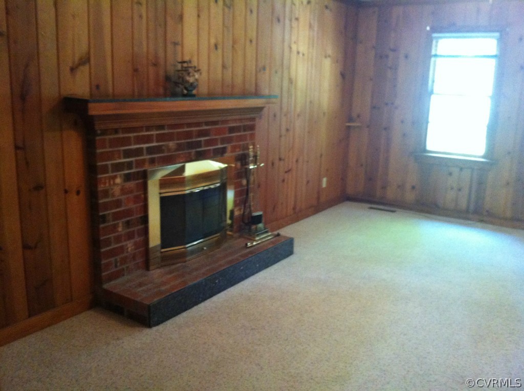 1231 Coalfield Road Midlothian, VA 23114 - Photo 6 of 12 a living room with a fireplace