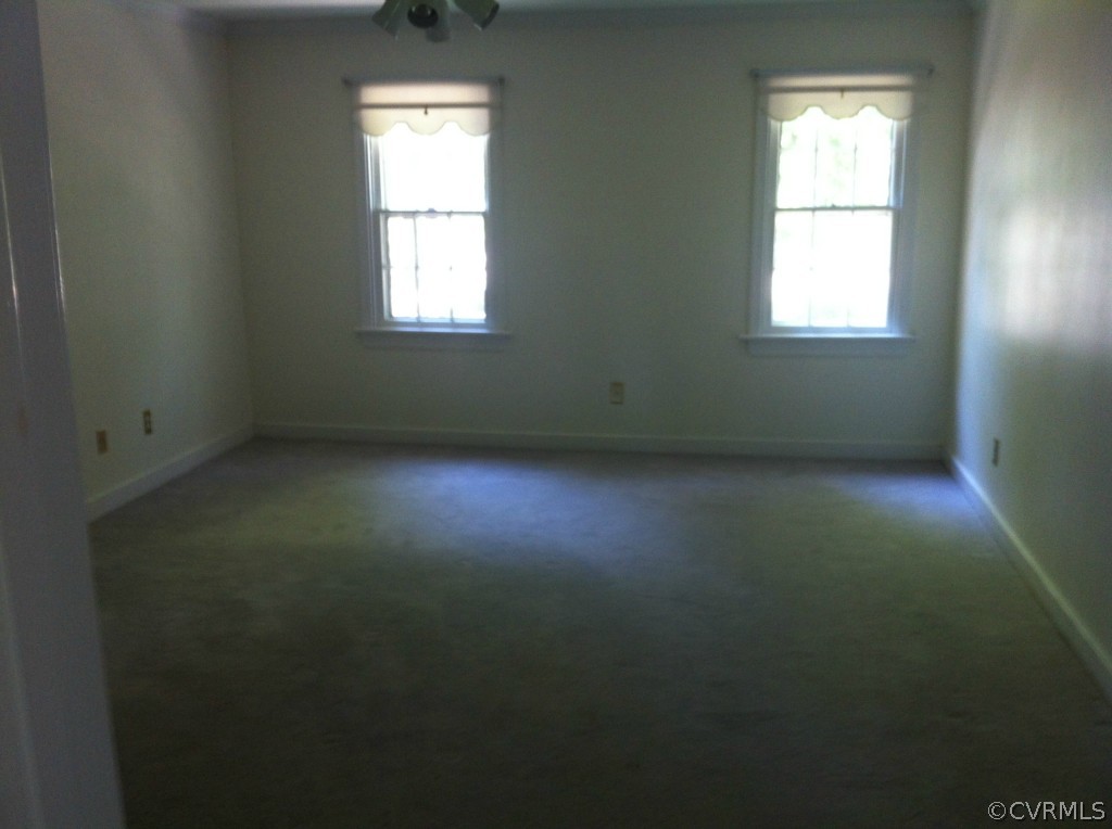 1231 Coalfield Road Midlothian, VA 23114 - Photo 7 of 12 an empty room with a window