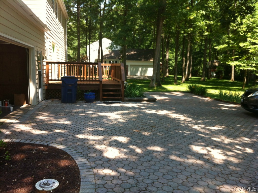 1231 Coalfield Road Midlothian, VA 23114 - Photo 10 of 12 a view of a house with backyard porch and sitting area