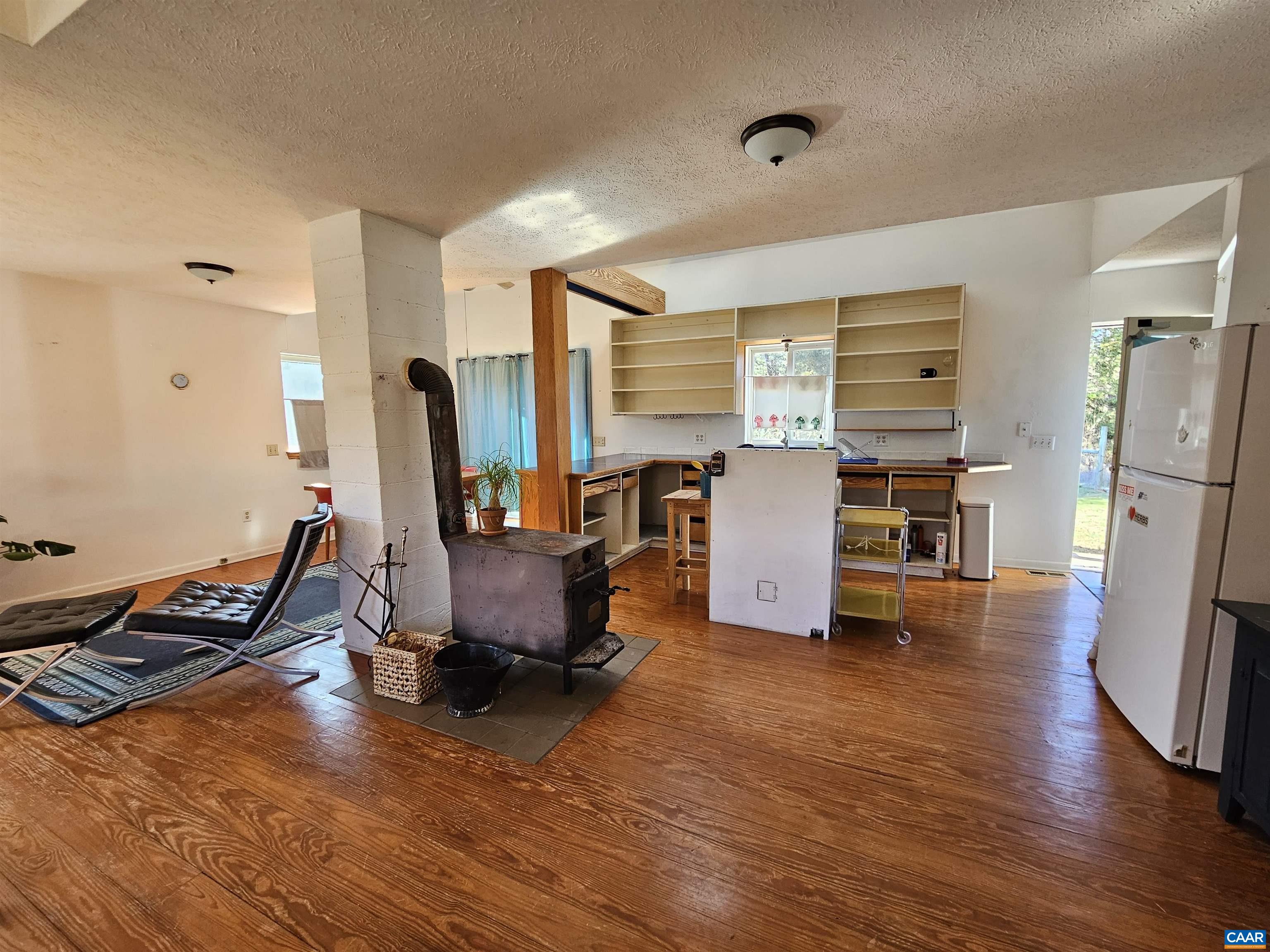 1859 Manteo Road Buckingham, VA 23921 - Photo 13 of 46 a living room with furniture and a wooden floor