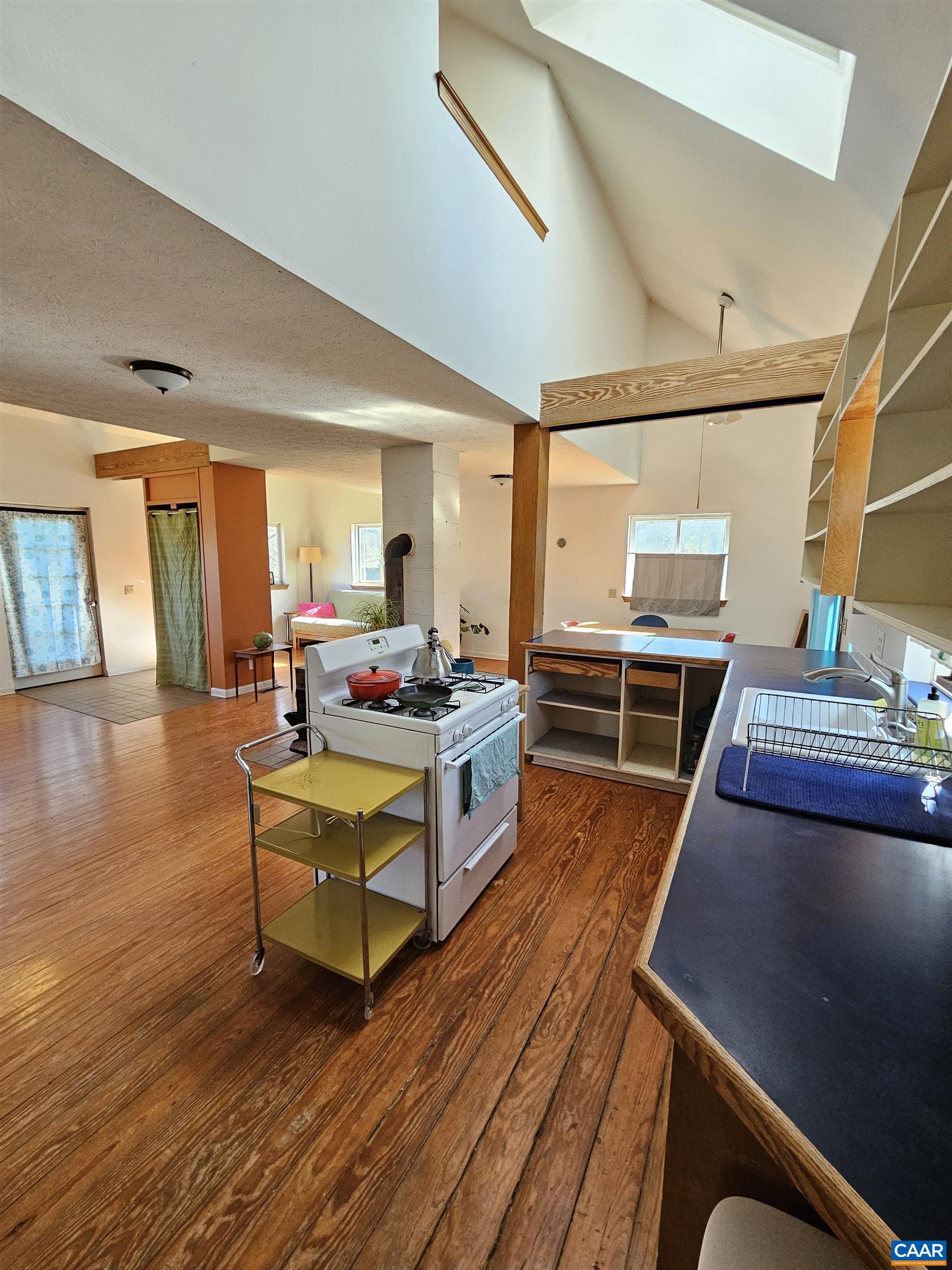 1859 Manteo Road Buckingham, VA 23921 - Photo 16 of 46 a living room with furniture and a wooden floor