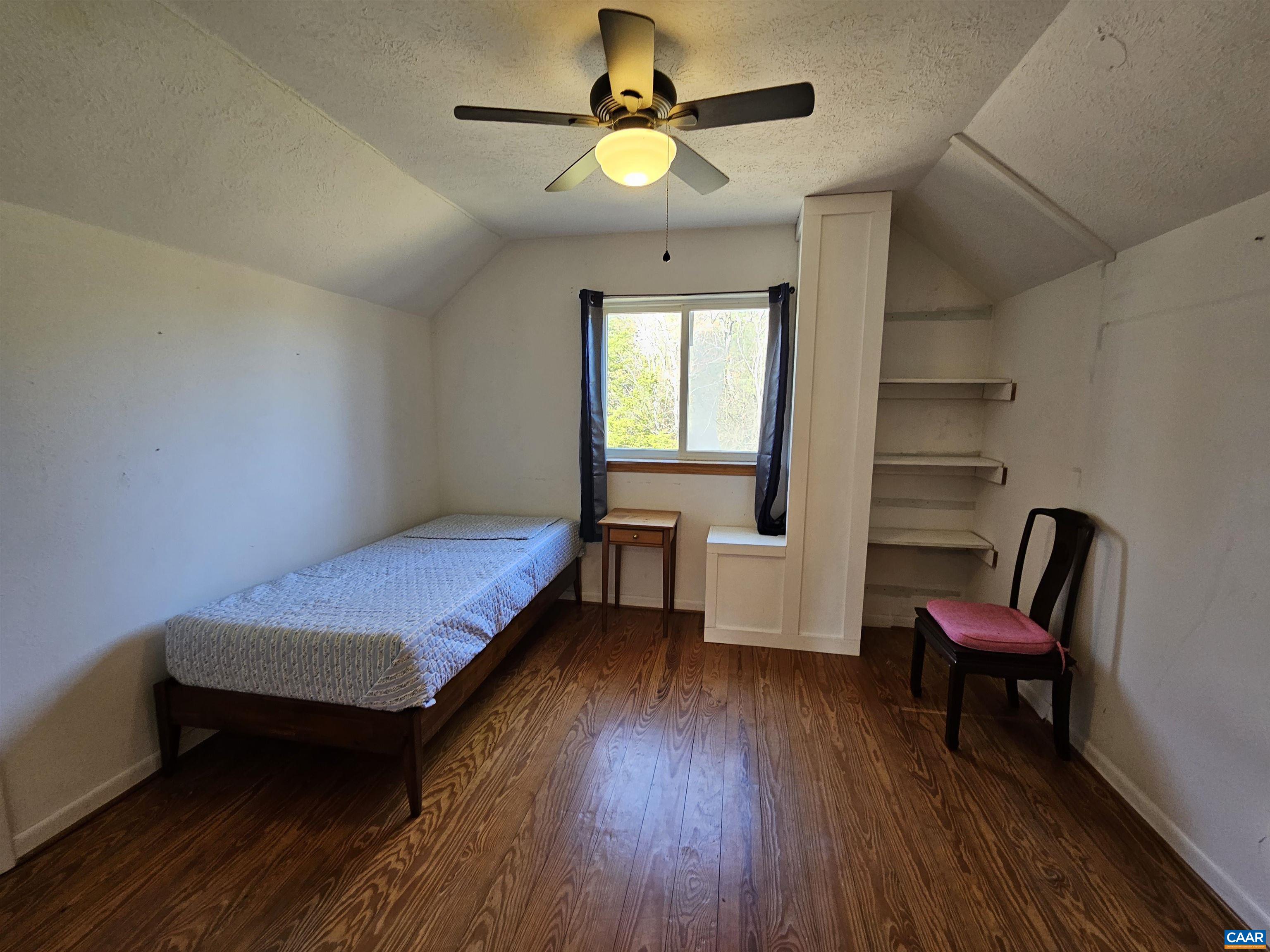 1859 Manteo Road Buckingham, VA 23921 - Photo 22 of 46 a bedroom with furniture and a window