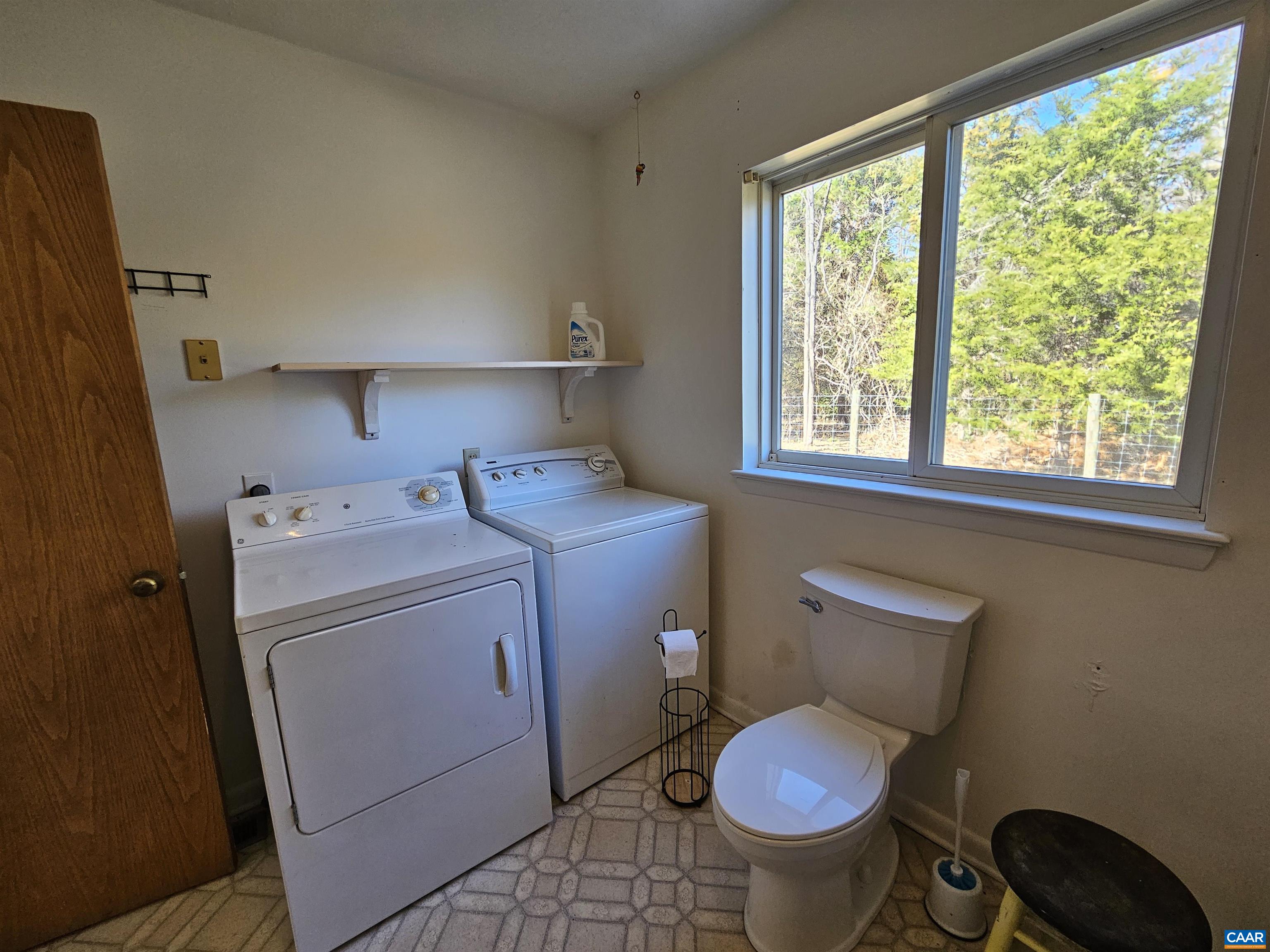 1859 Manteo Road Buckingham, VA 23921 - Photo 27 of 46 a bathroom with a sink toilet and a window