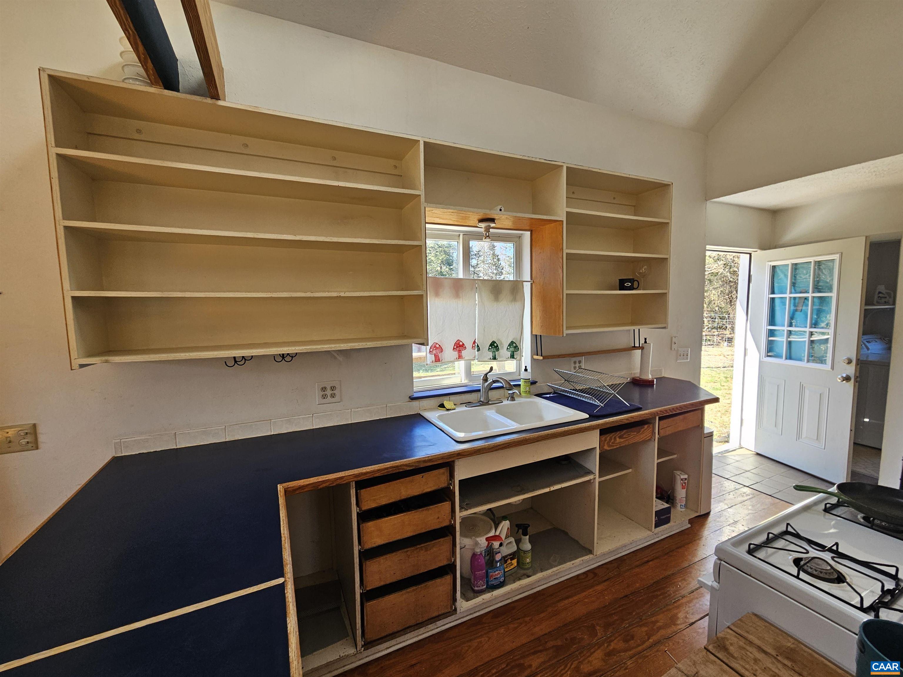 1859 Manteo Road Buckingham, VA 23921 - Photo 30 of 46 a room with furniture and wooden floor