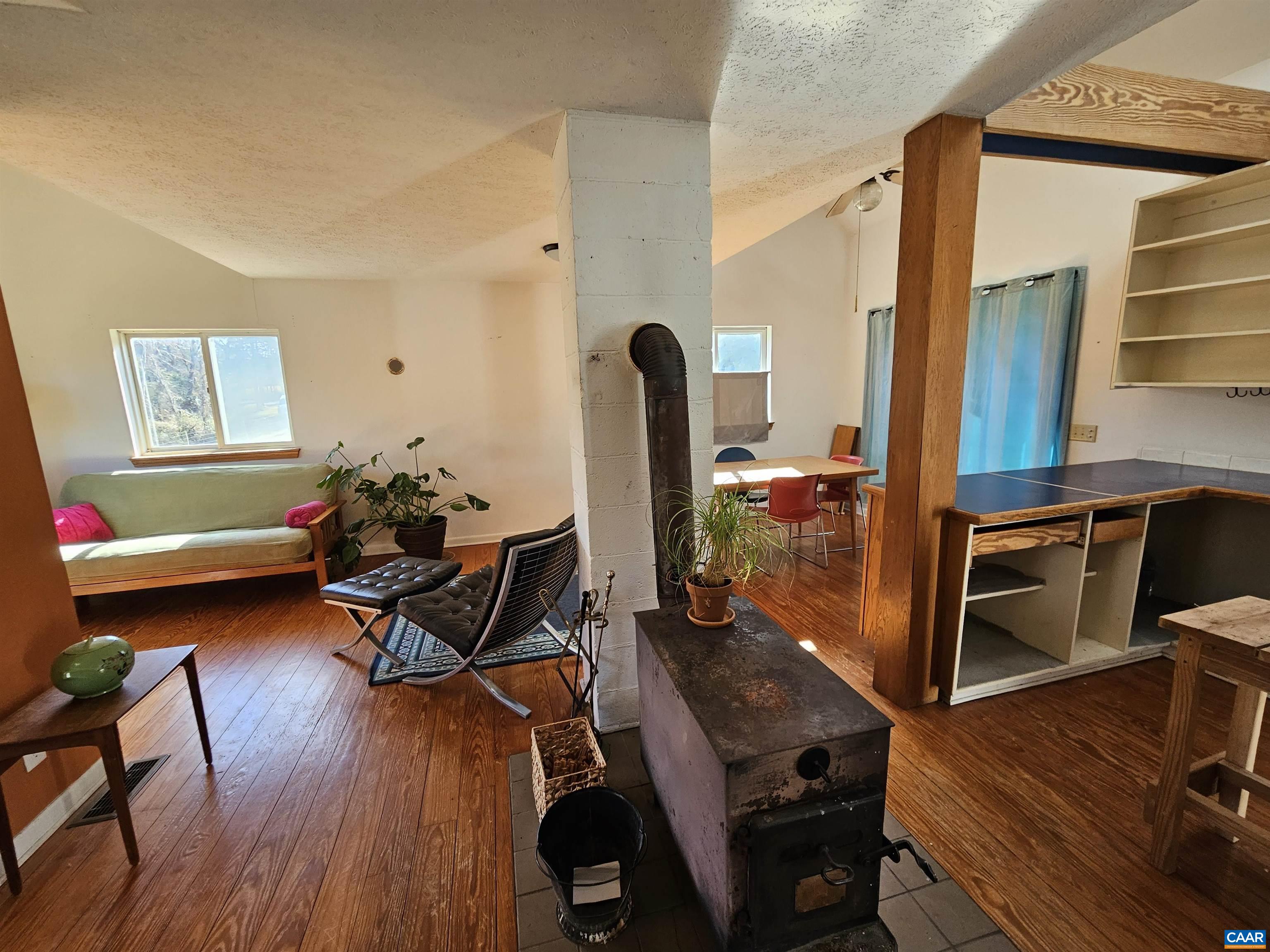 1859 Manteo Road Buckingham, VA 23921 - Photo 33 of 46 a living room with furniture and wooden floor