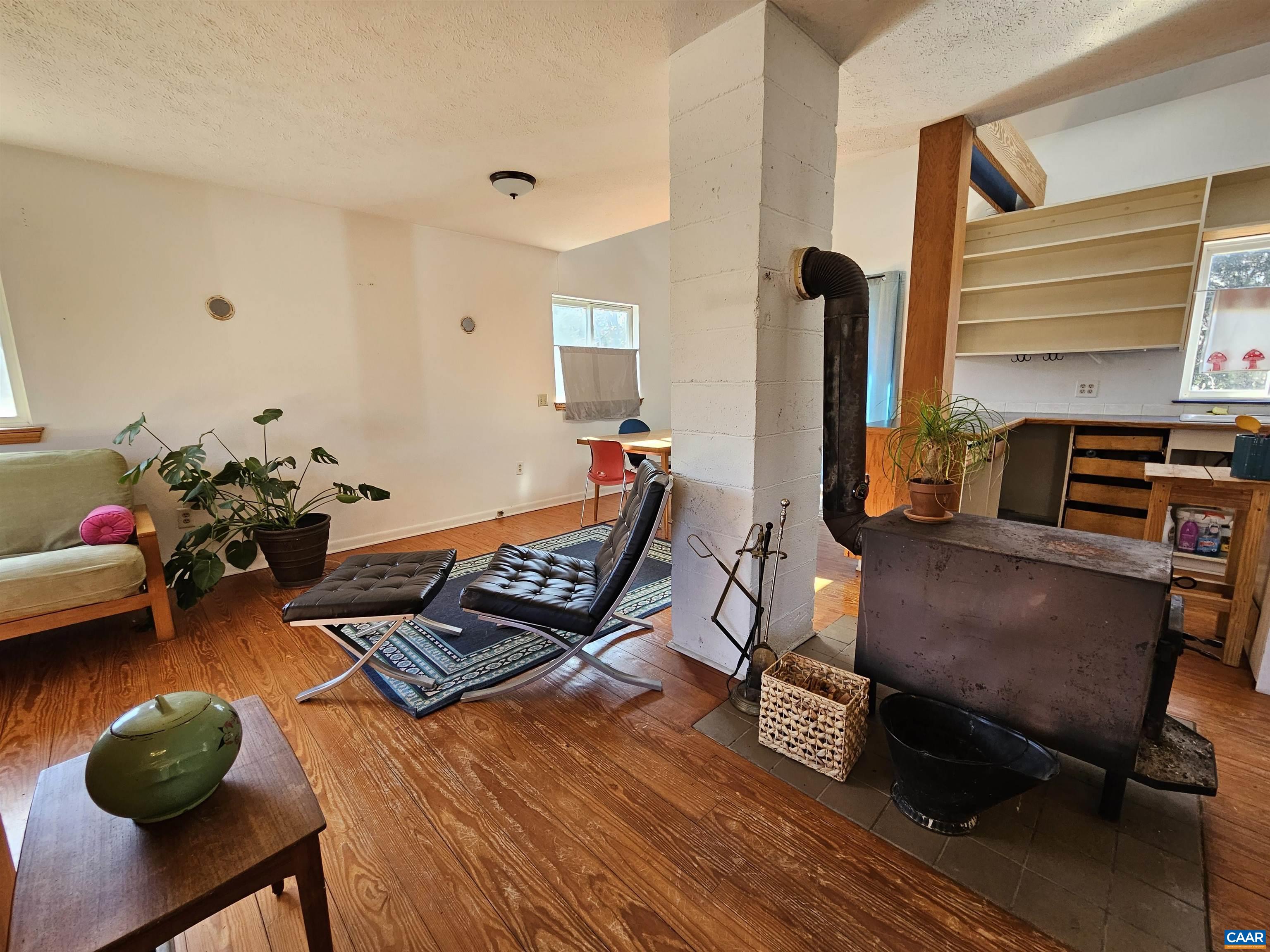 1859 Manteo Road Buckingham, VA 23921 - Photo 8 of 46 a living room with furniture and wooden floor