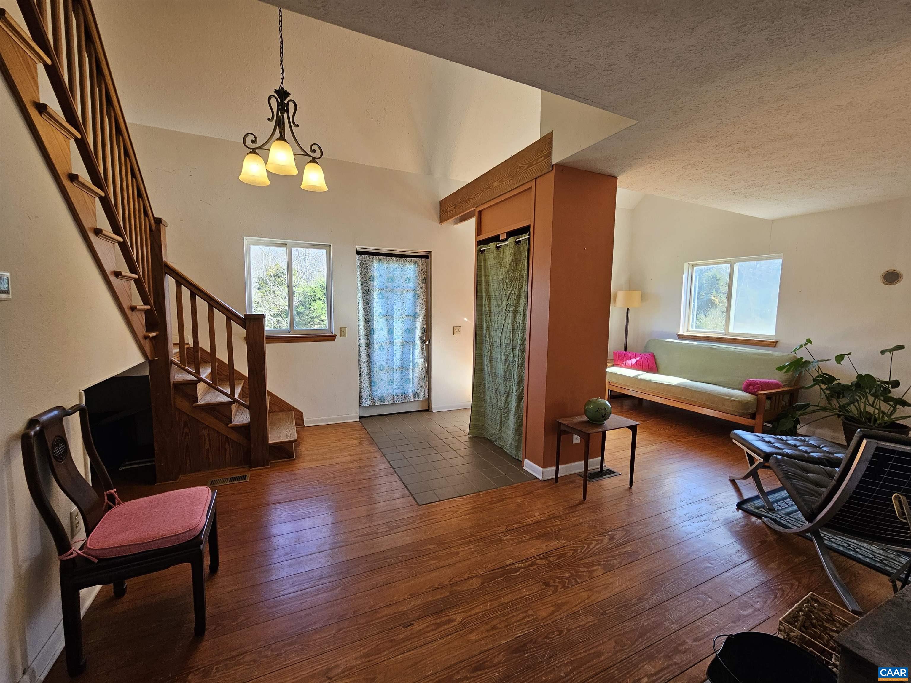 1859 Manteo Road Buckingham, VA 23921 - Photo 9 of 46 a view of a livingroom with furniture and hardwood floor