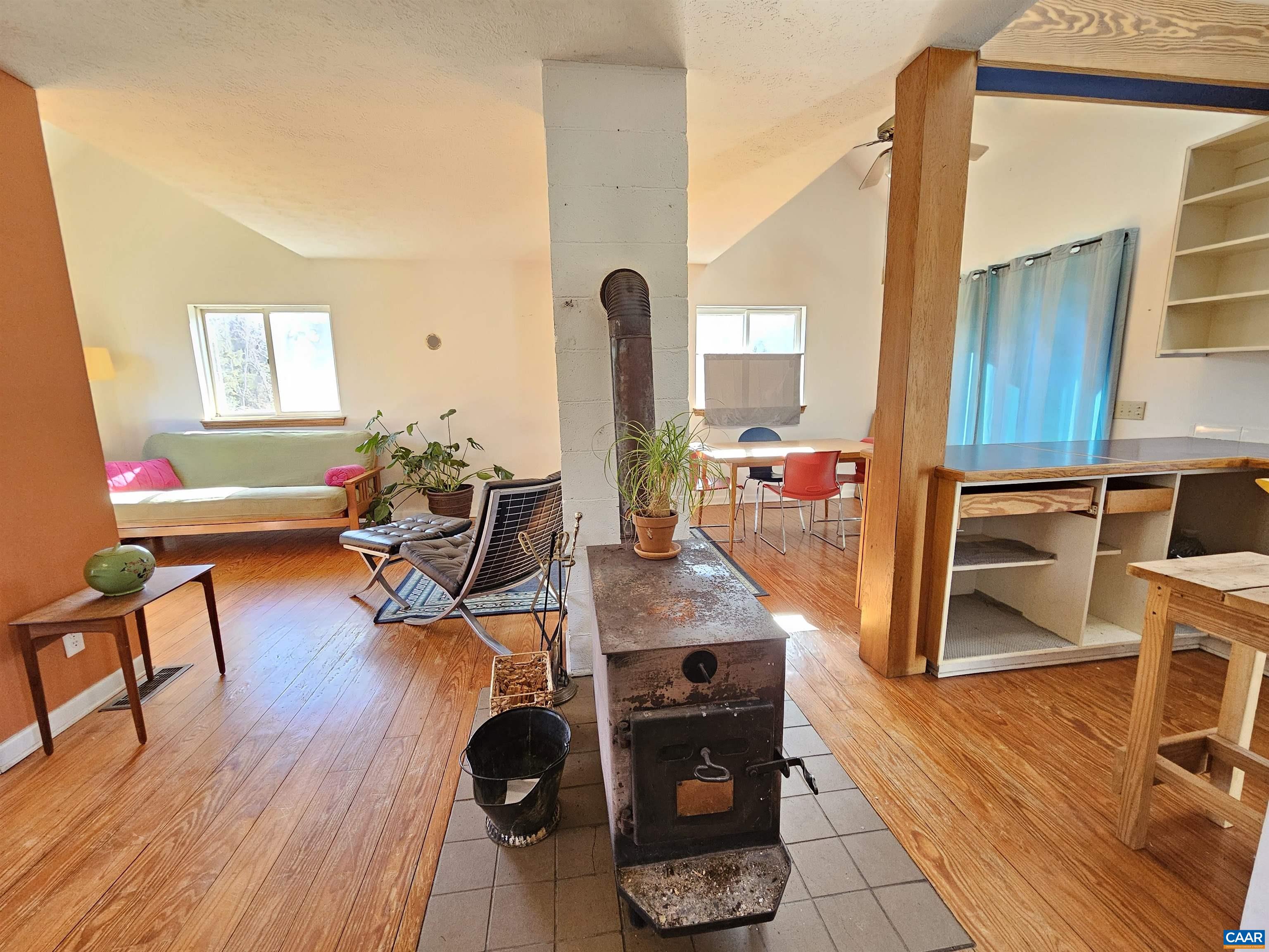 1859 Manteo Road Buckingham, VA 23921 - Photo 10 of 46 a living room with furniture and wooden floor