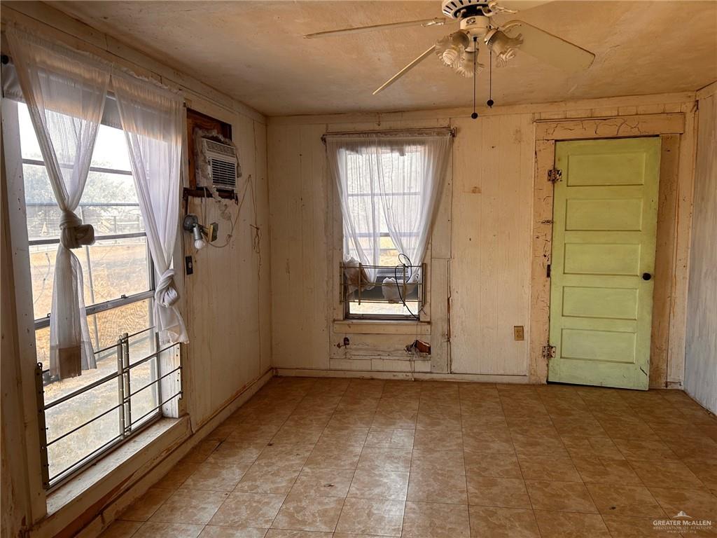 30034 Couch Street Hargill, TX 78549 - Photo 3 of 13 a view of an empty room with a window
