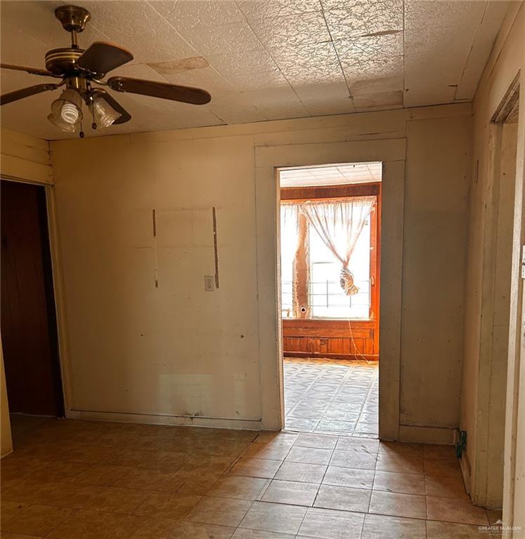 30034 Couch Street Hargill, TX 78549 - Photo 4 of 13 a view of a livingroom with a window