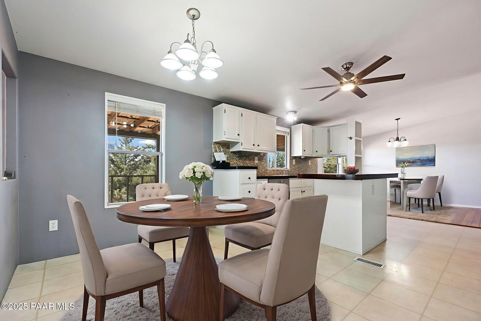 18125 East Roper Way Dewey, AZ 86327 - Photo 17 of 63 a dining room with furniture and window