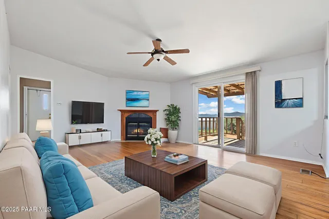 a living room with furniture and a table