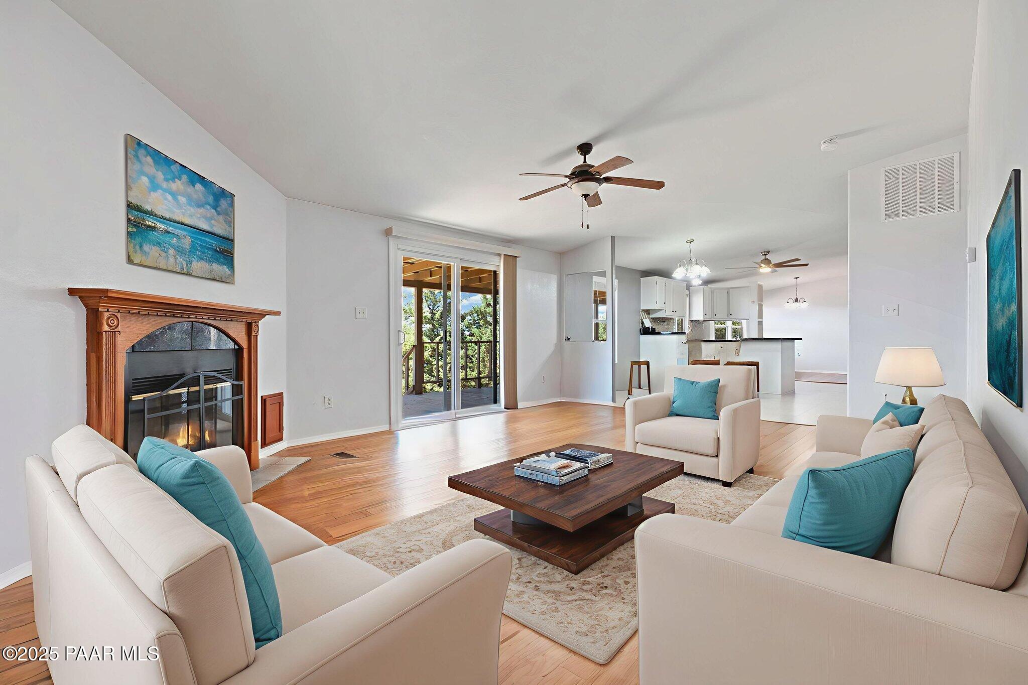 18125 East Roper Way Dewey, AZ 86327 - Photo 21 of 63 a living room with furniture and a table