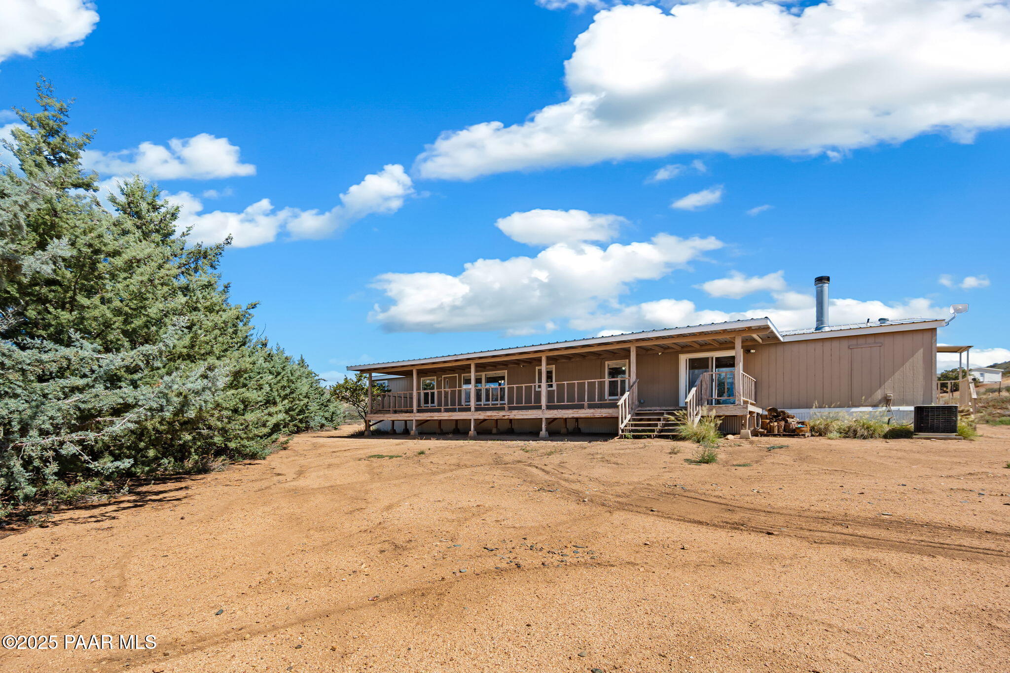 18125 East Roper Way Dewey, AZ 86327 - Photo 45 of 63 a view of a house with a patio