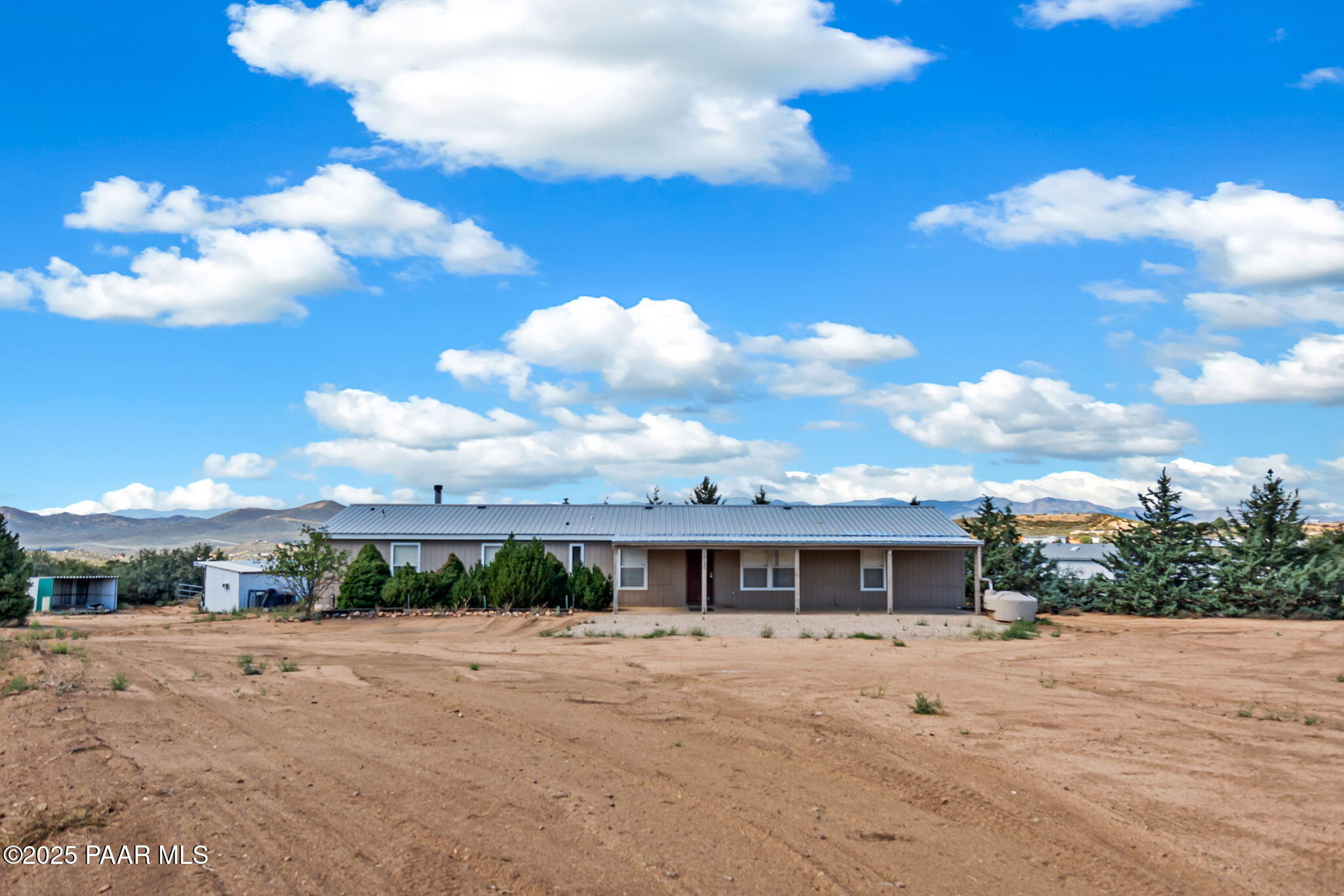 18125 East Roper Way Dewey, AZ 86327 - Photo 48 of 63 a view of a house with a yard