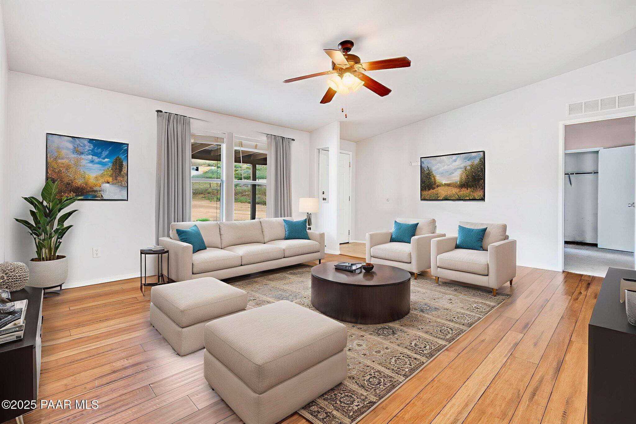 18125 East Roper Way Dewey, AZ 86327 - Photo 8 of 63 a living room with furniture and a large window
