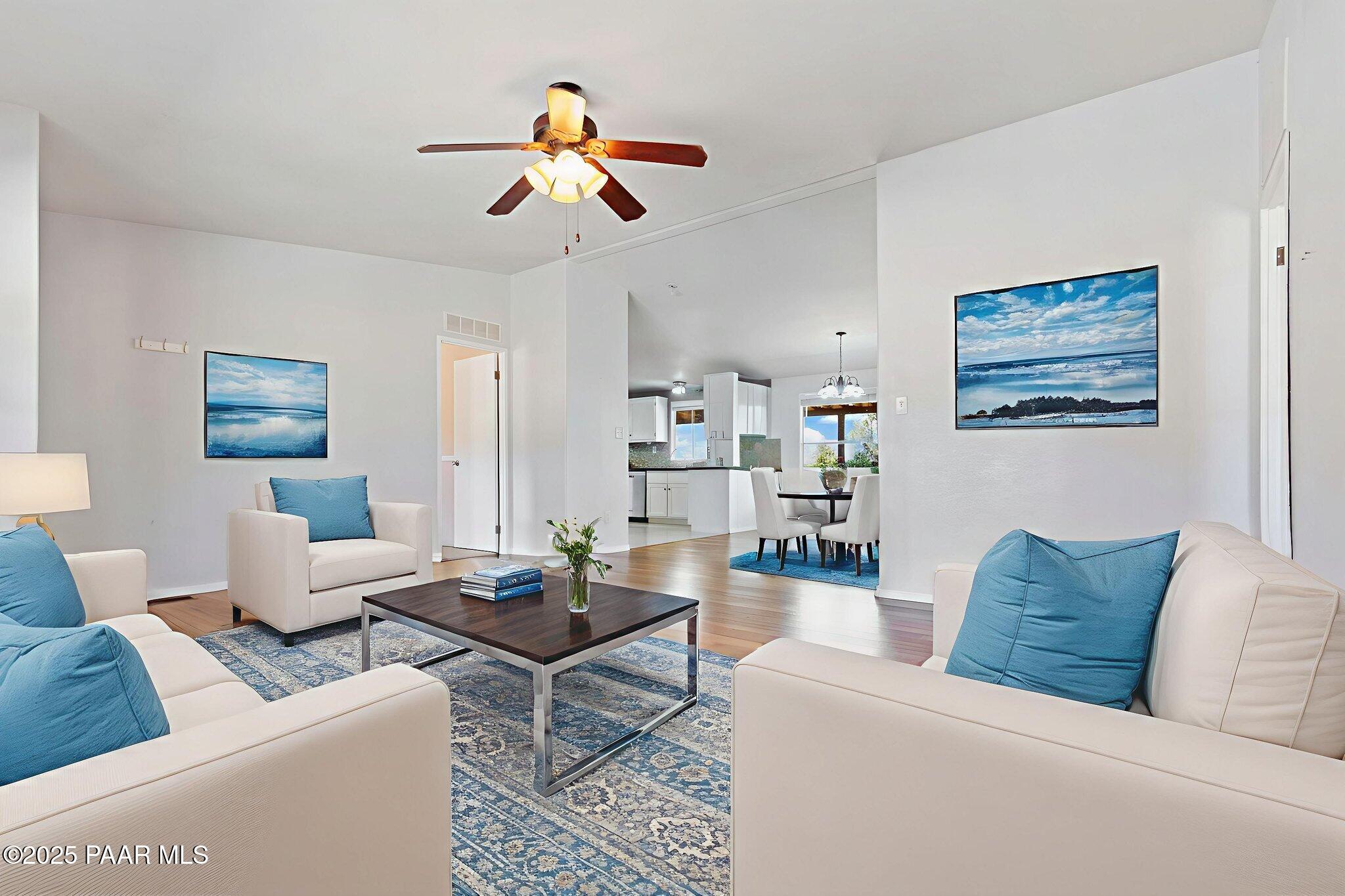 18125 East Roper Way Dewey, AZ 86327 - Photo 10 of 63 a living room with furniture and kitchen view