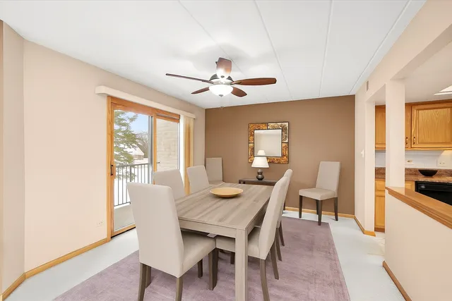 a kitchen with a stove a microwave and a refrigerator