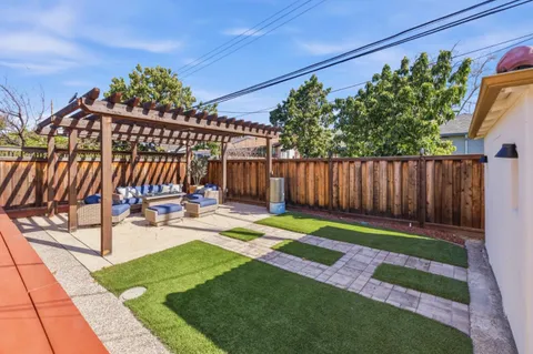 a view of a backyard with a patio