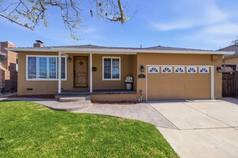 front view of a building with a yard