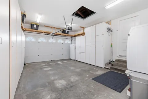 a kitchen with stainless steel appliances a refrigerator and a stove