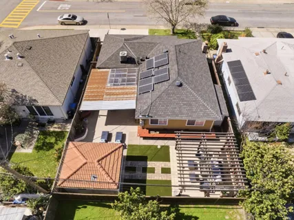 an aerial view of a house with a garden