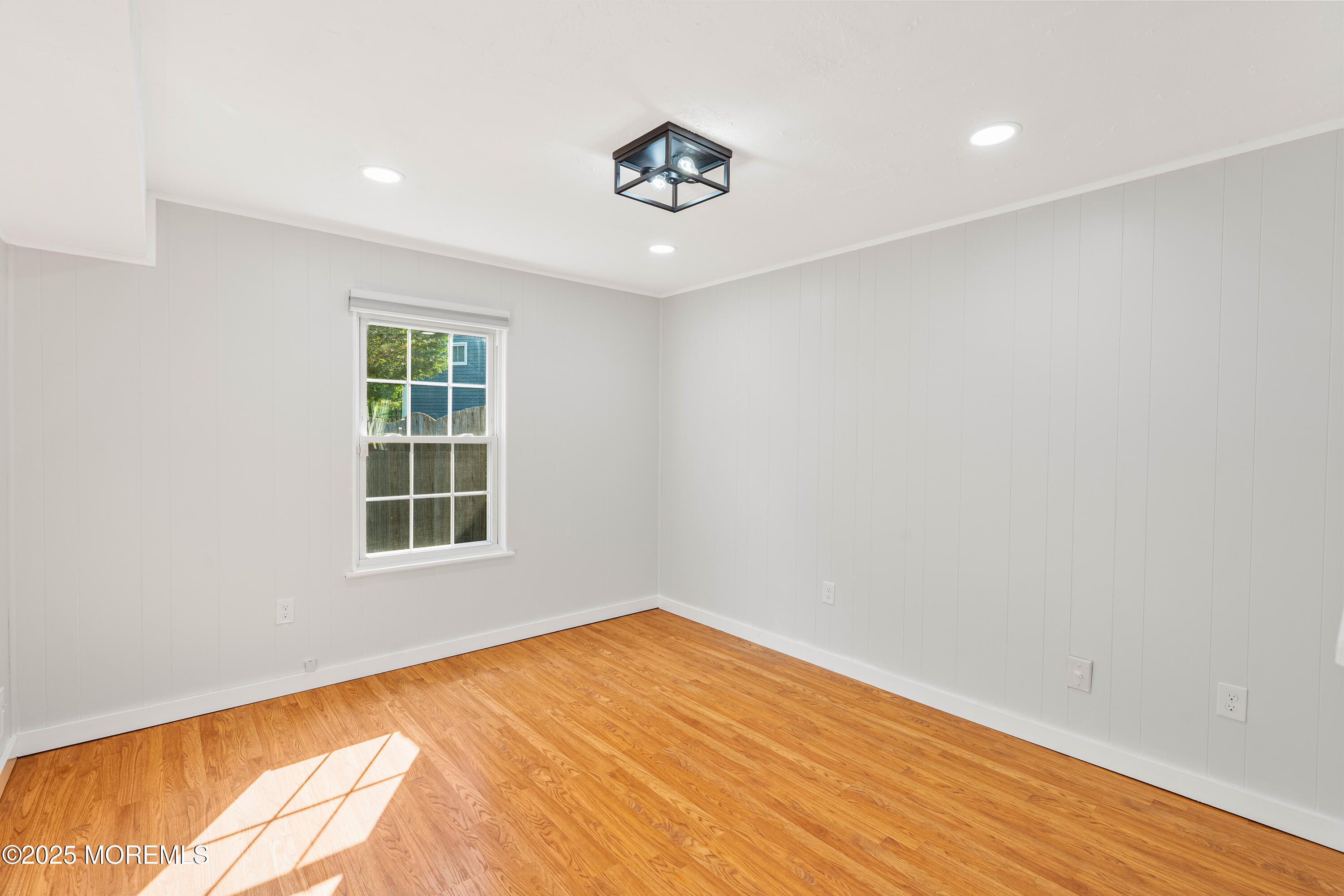 61 Berkshire Drive Howell, NJ 07731 - Photo 13 of 43 an empty room with a window