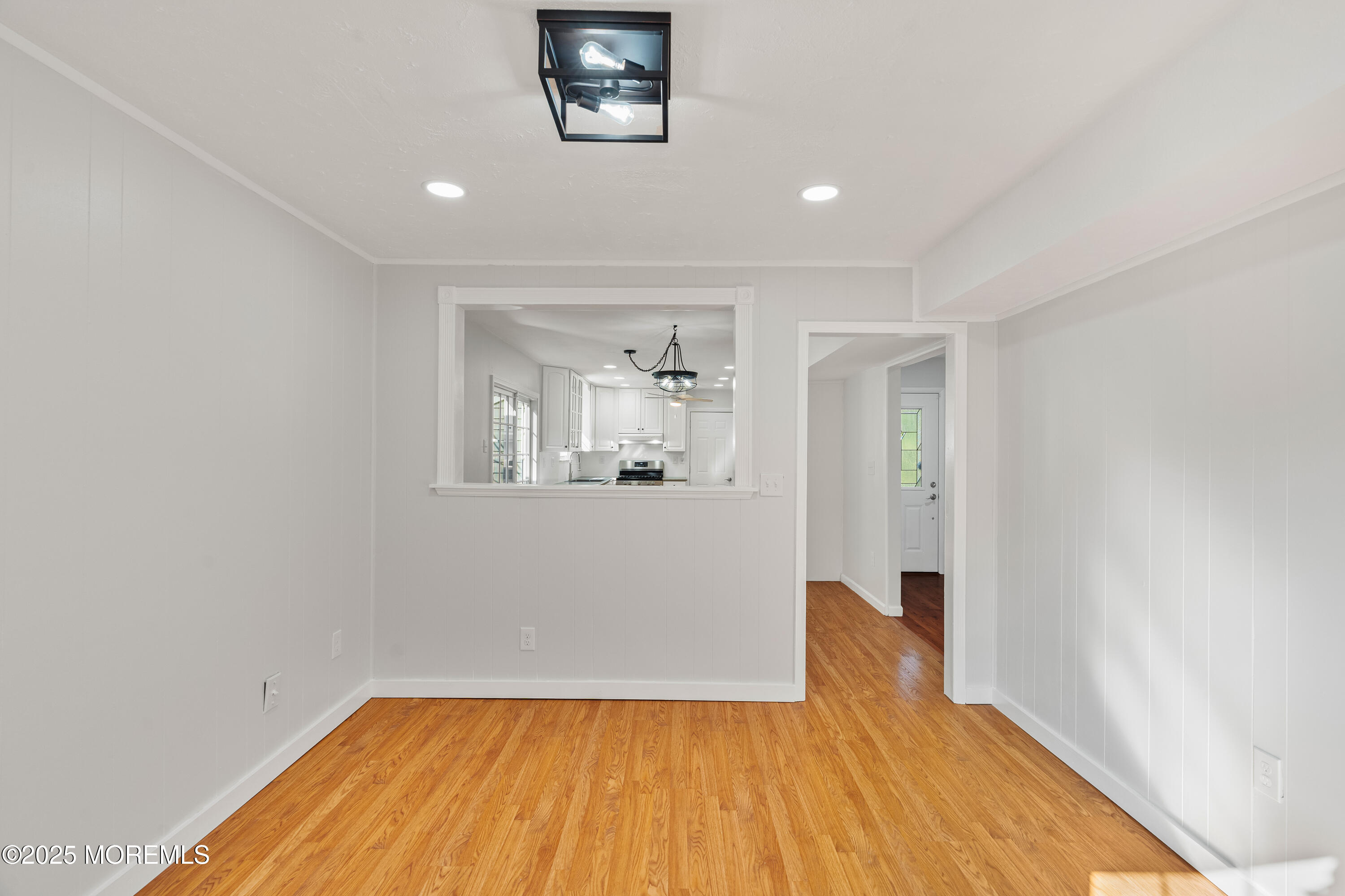 61 Berkshire Drive Howell, NJ 07731 - Photo 14 of 43 a view of a big room with wooden floor and a bathroom