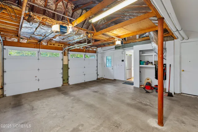 a view of a room with wooden walls