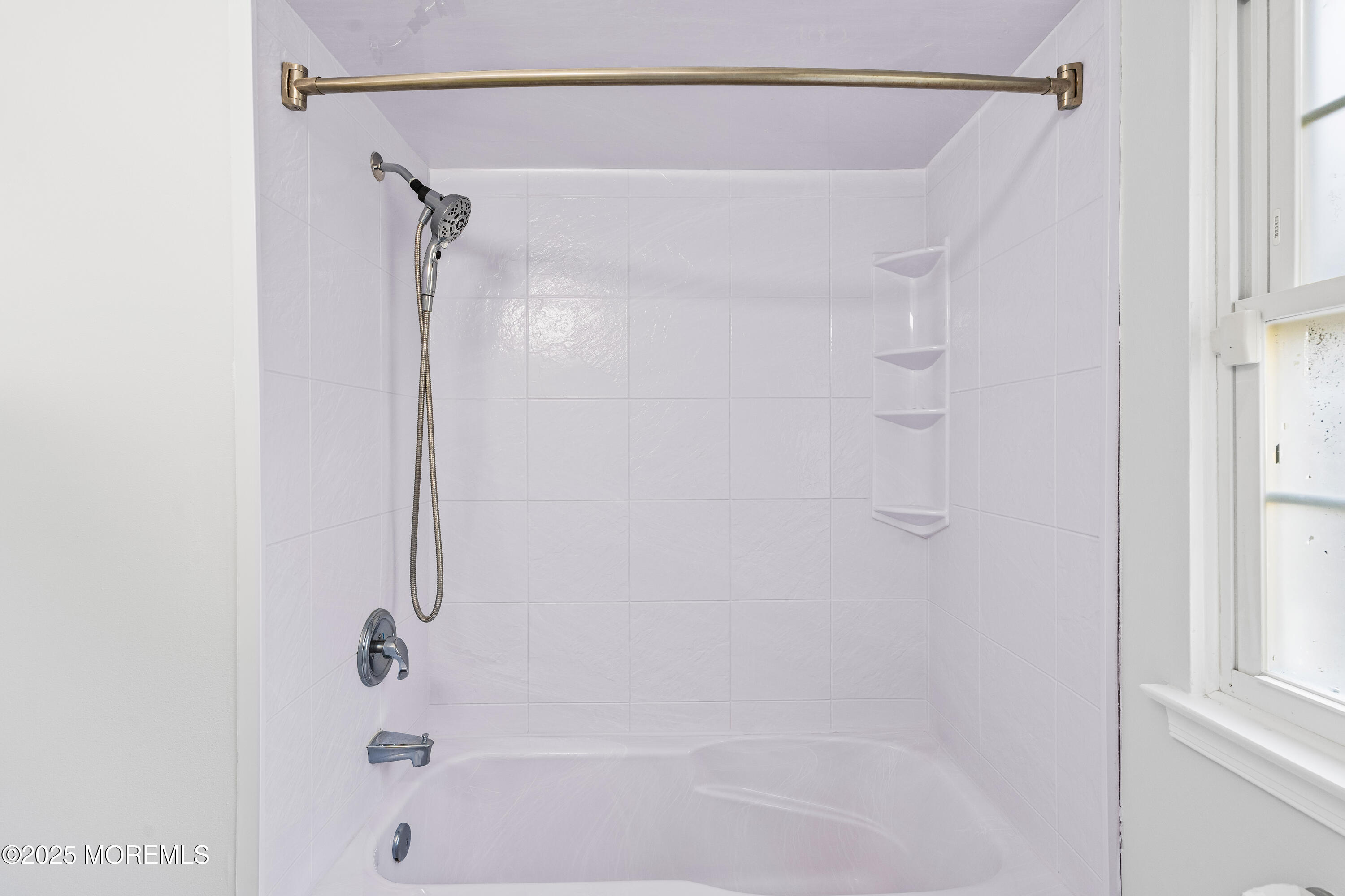 61 Berkshire Drive Howell, NJ 07731 - Photo 35 of 43 a bathroom with a shower and a bath tub