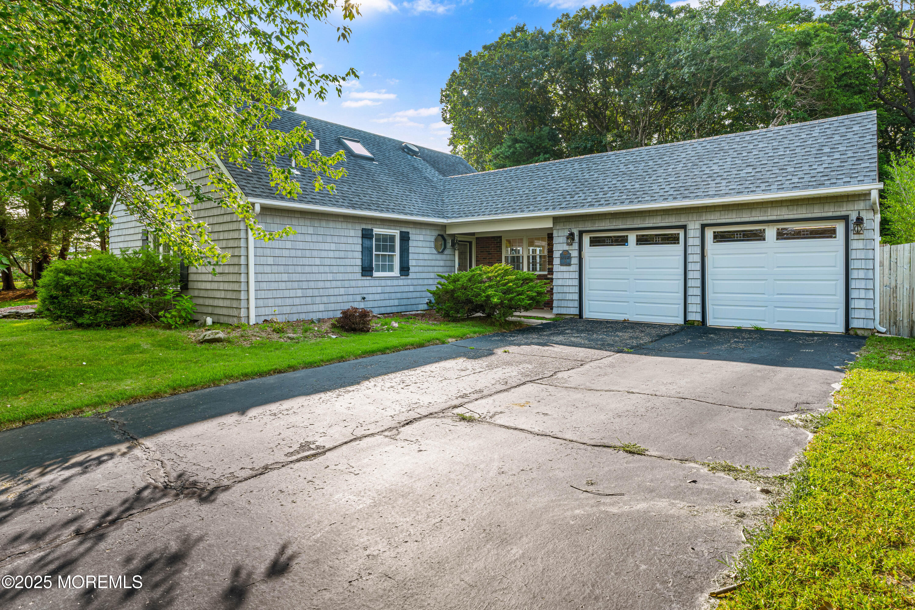 61 Berkshire Drive Howell, NJ 07731 - Photo 4 of 43 a front view of house with yard and green space