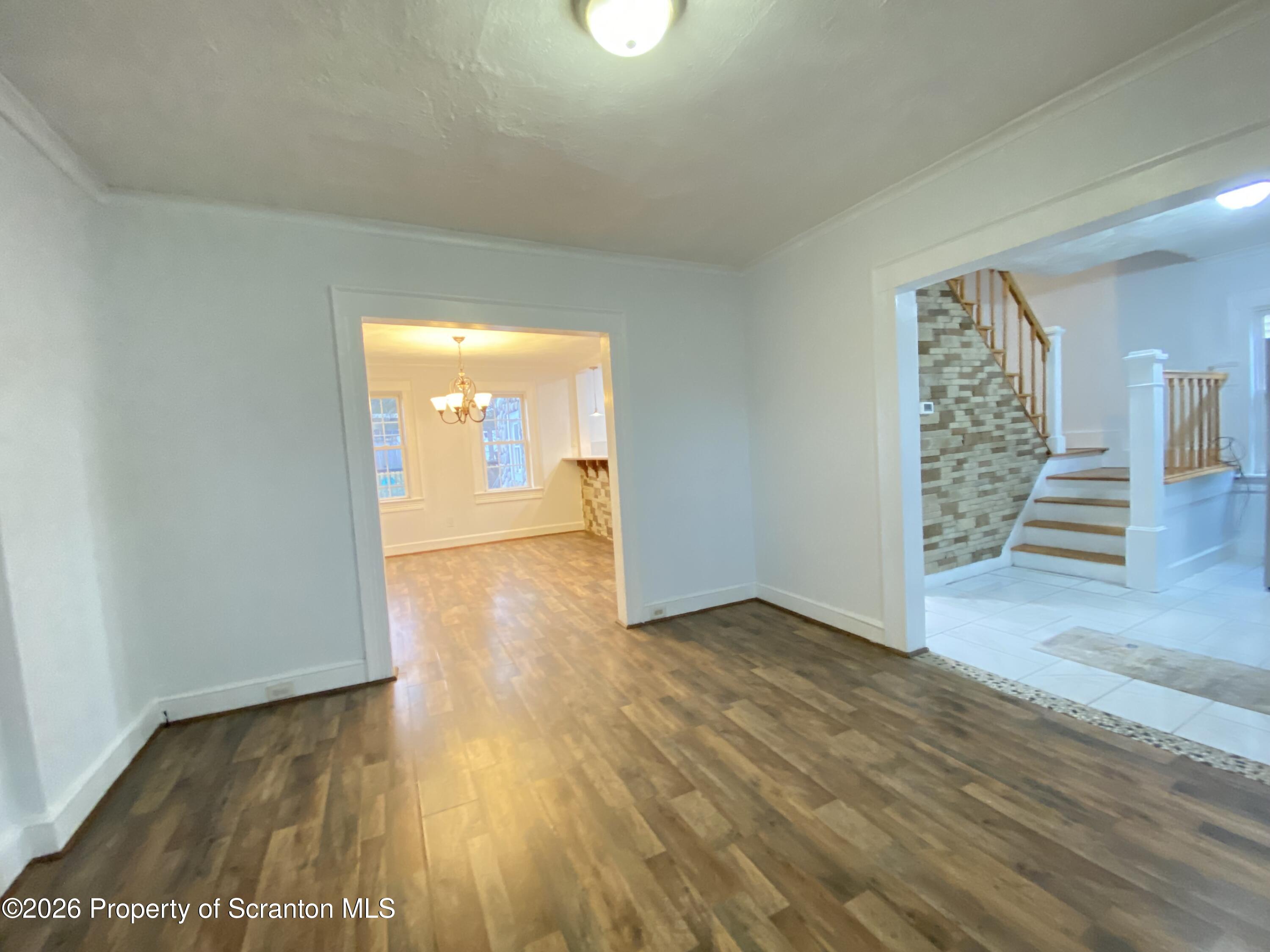 1827 Prospect Avenue Scranton, PA 18505 - Photo 19 of 48 a view of a hallway with wooden floor