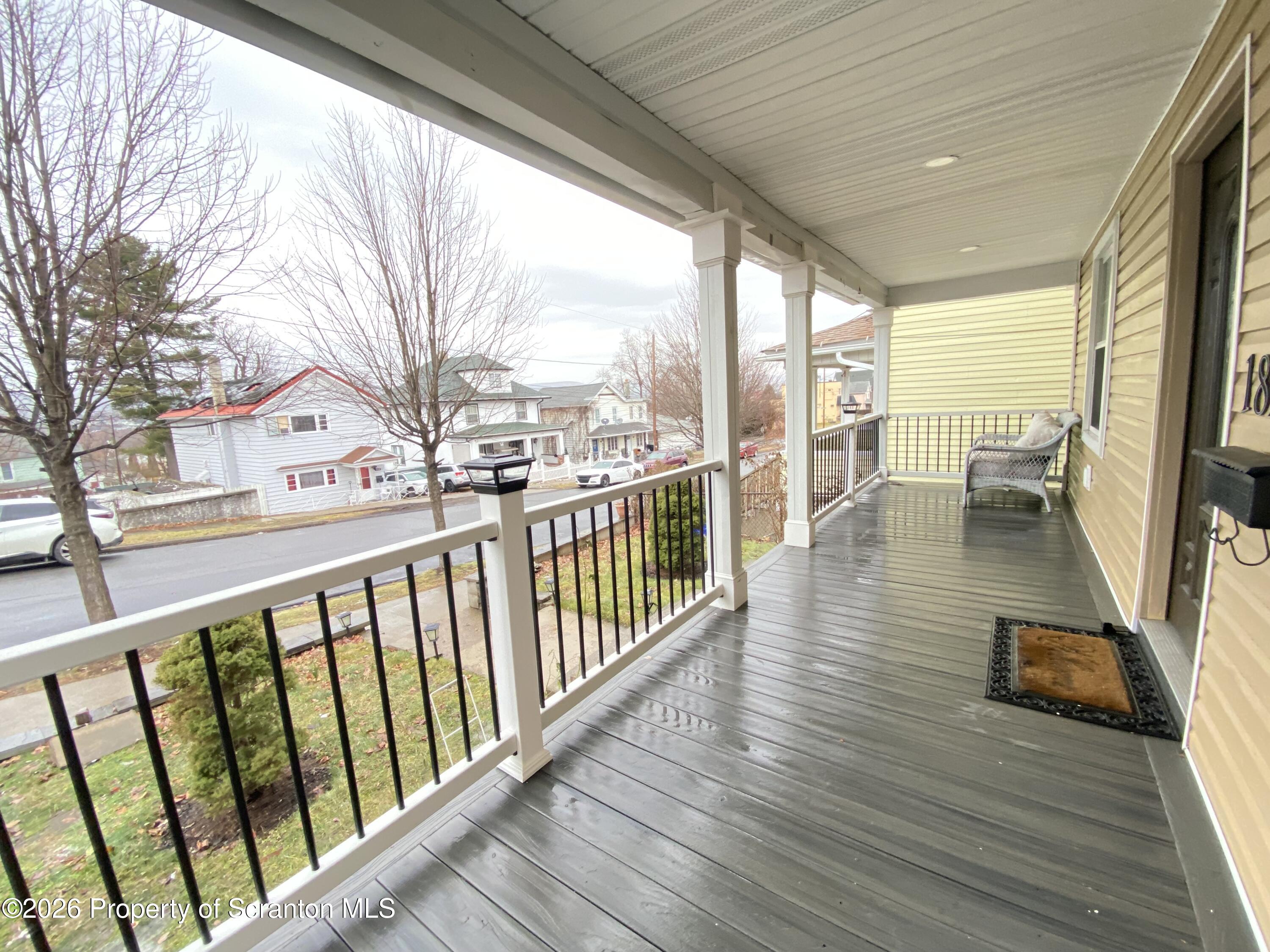 1827 Prospect Avenue Scranton, PA 18505 - Photo 2 of 48 a view of a balcony with wooden floor