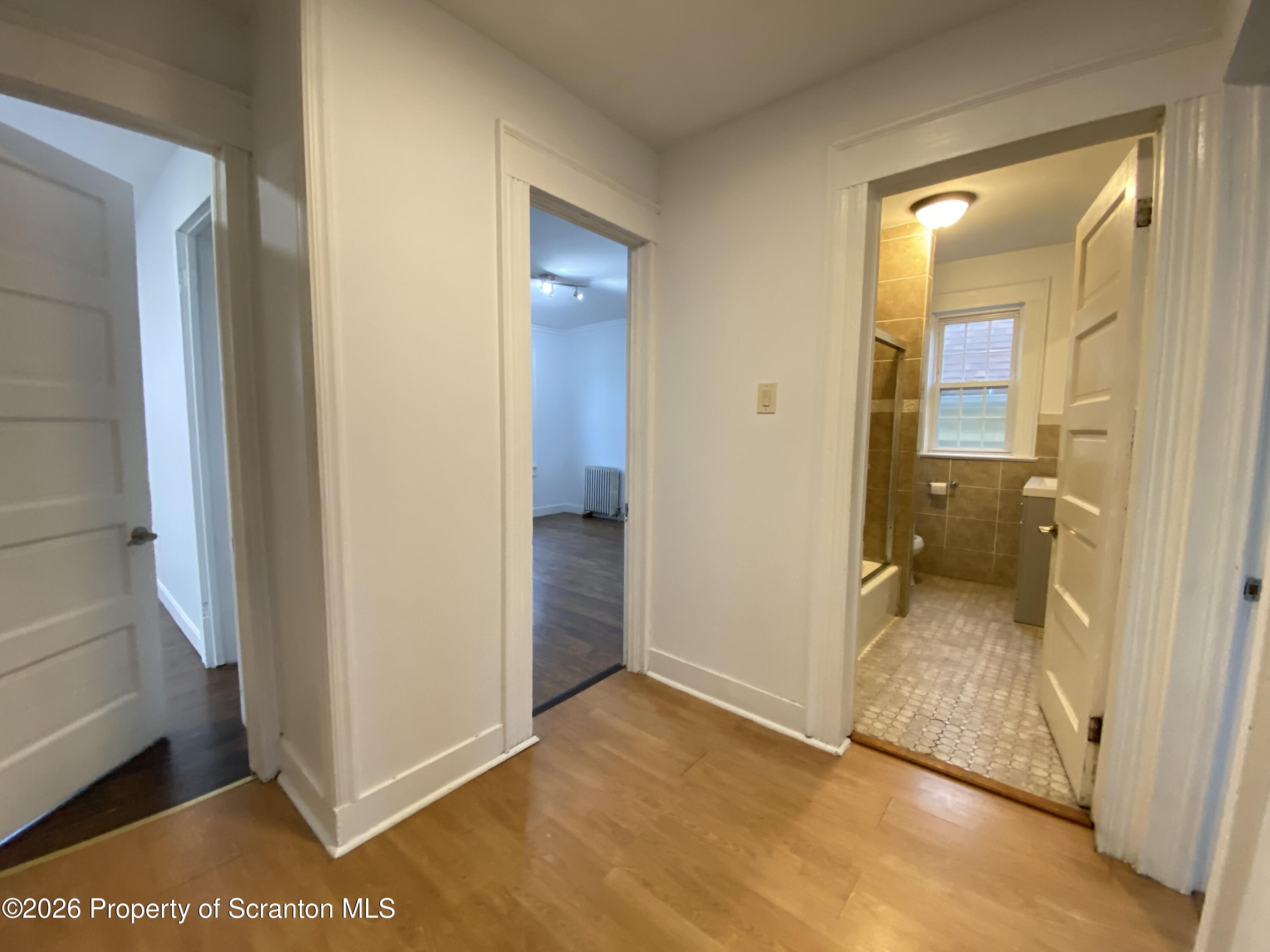 1827 Prospect Avenue Scranton, PA 18505 - Photo 22 of 48 a view of a bathroom from a hallway