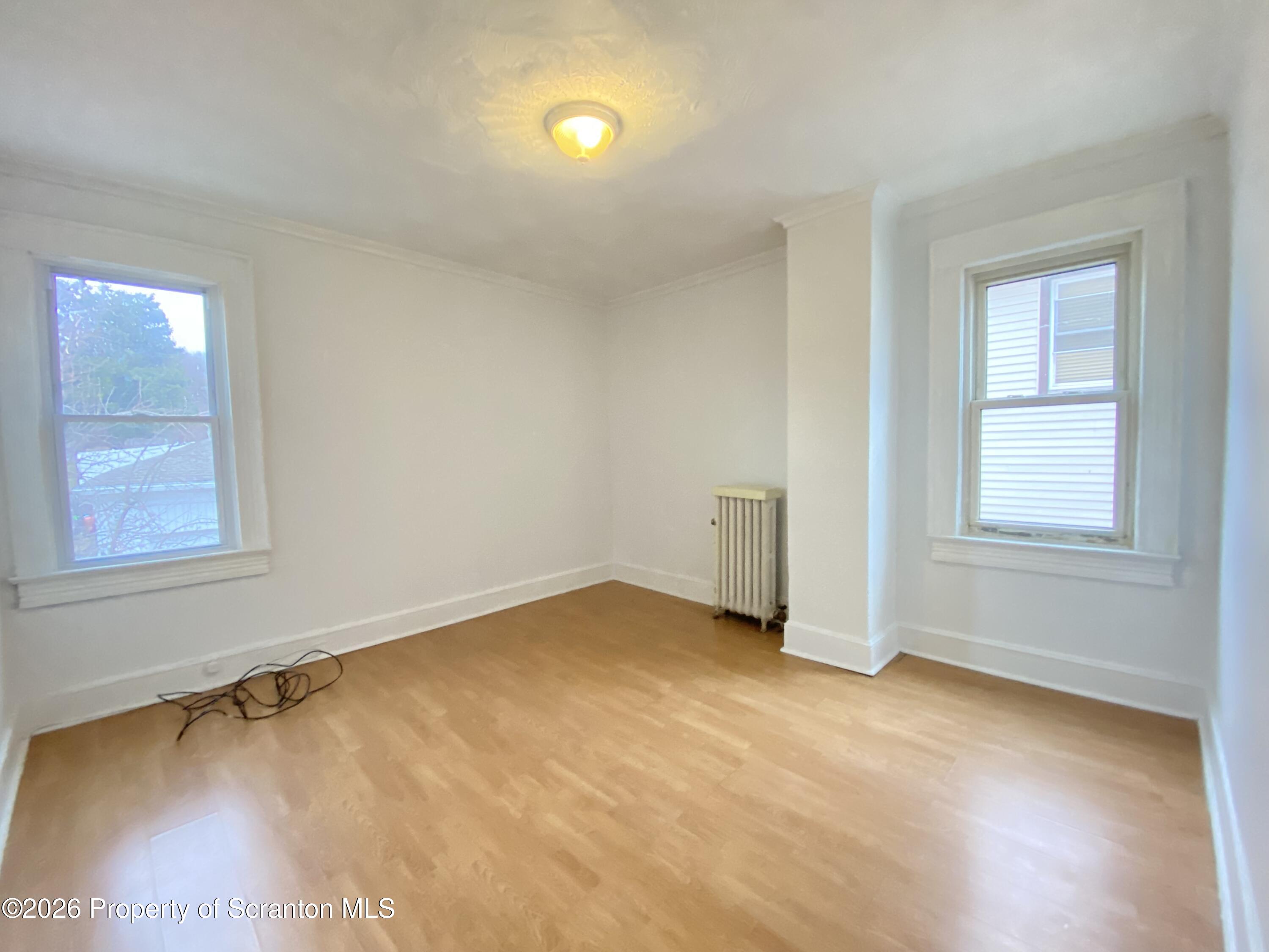 1827 Prospect Avenue Scranton, PA 18505 - Photo 26 of 48 an empty room with windows