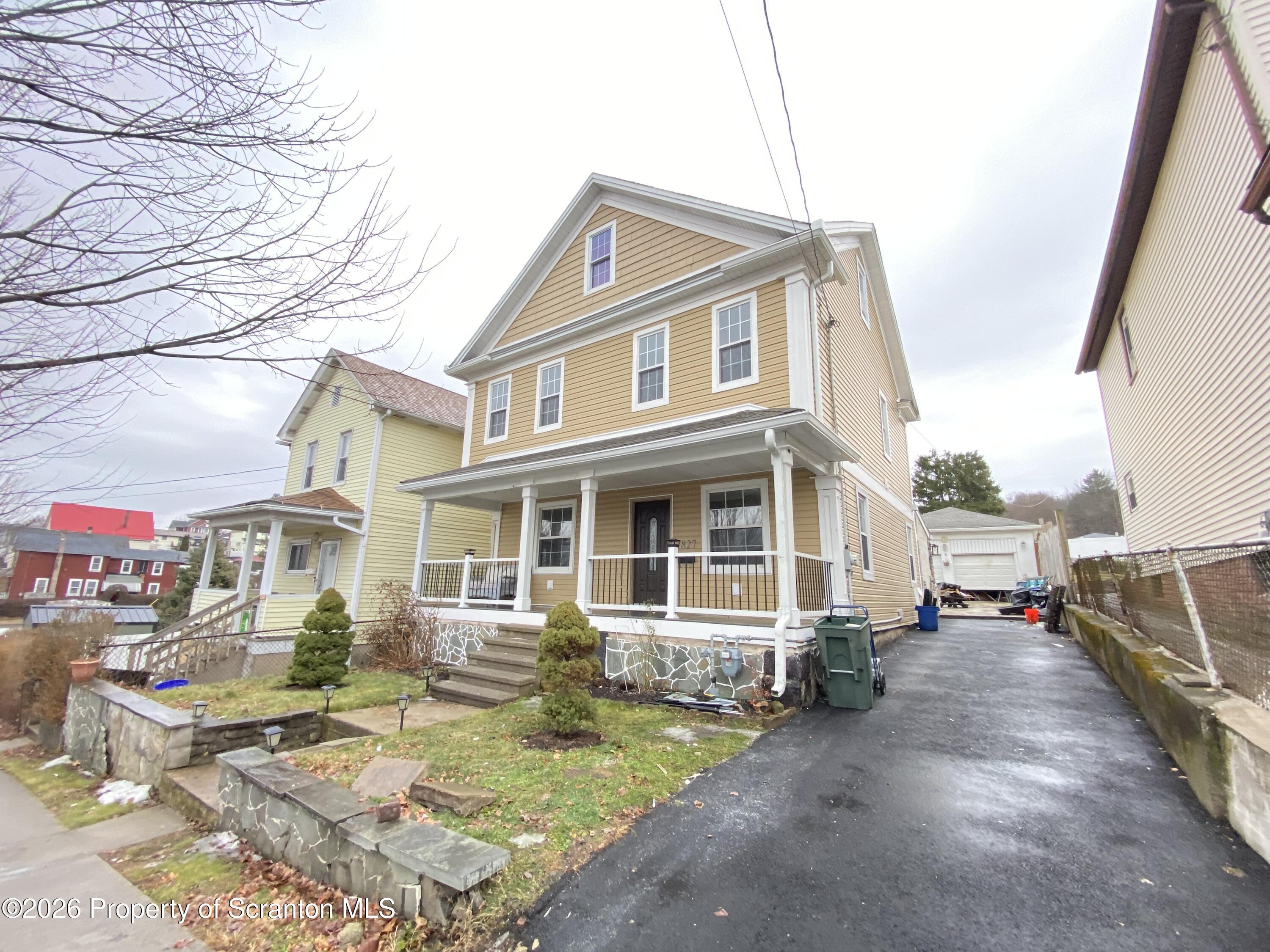 1827 Prospect Avenue Scranton, PA 18505 - Photo 48 of 48 a front view of a house with garden